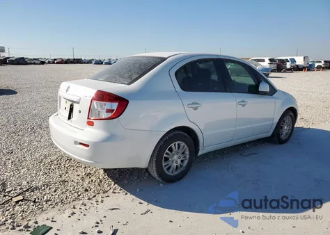 2012 Suzuki Sx4 Le z USA, uszkodzony, nr VIN JS2YC5A37C6303297